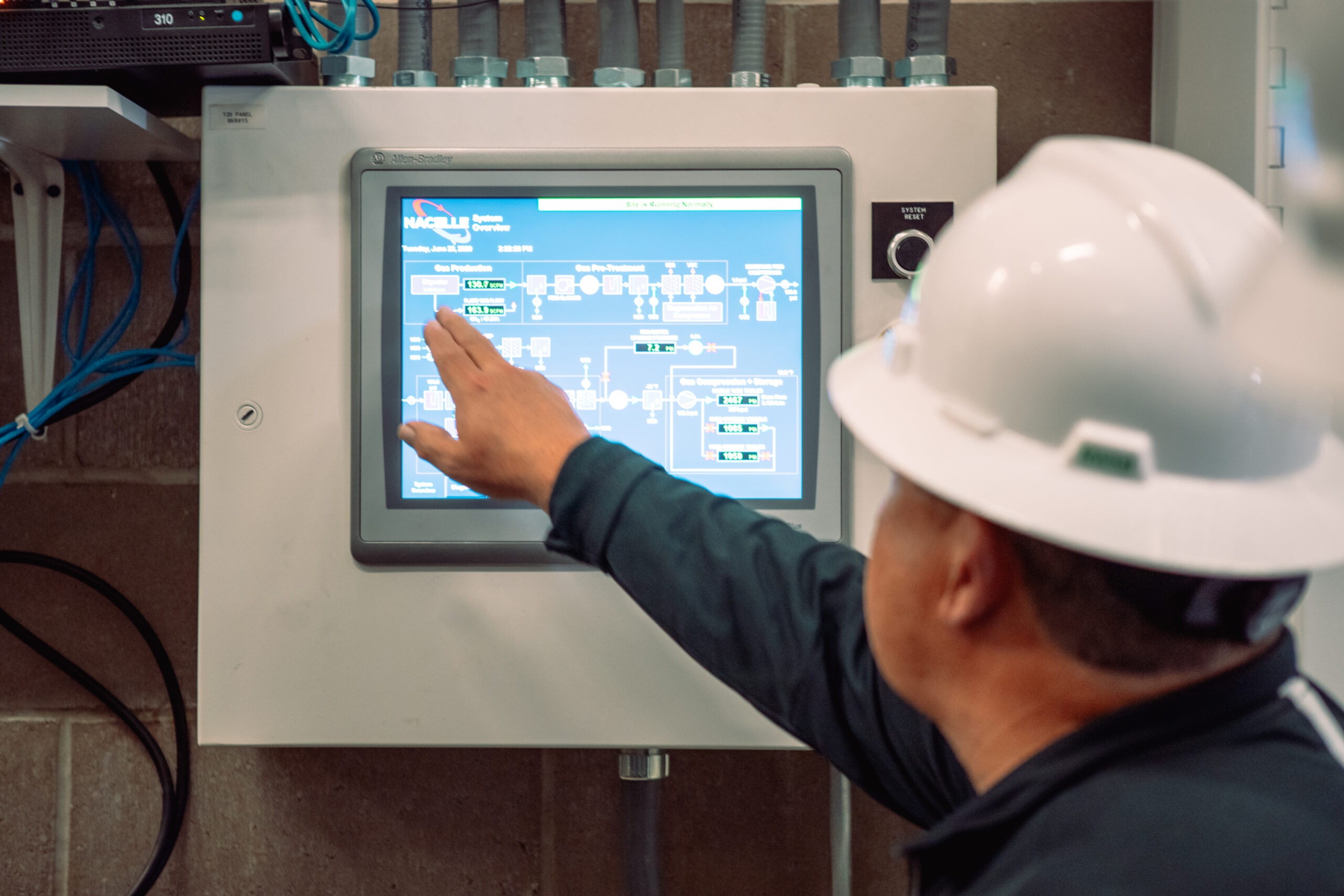 Nacelle Solutions technician operating SCADA monitoring system